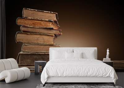 Old books on wooden table Wall mural