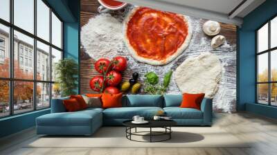 Pizza dough on rustic wooden table Wall mural