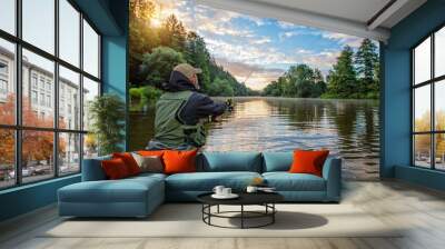 Sport fisherman hunting fish. Outdoor fishing in river Wall mural