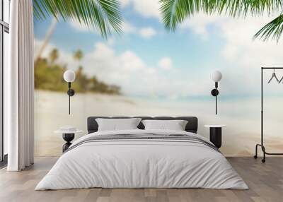 Summer sandy beach with blur ocean on background Wall mural