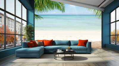 Summer sandy beach with blur ocean on background Wall mural