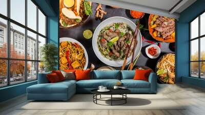 Top view composition of various Asian food in bowl Wall mural