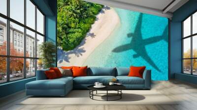 Travel concept with airplane shadow and beach Wall mural