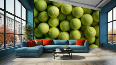 Sports equipment on grass Tennis balls on a green surface Wall mural