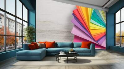 Colorful stack of sample swatches for paint or fabric in spectrum rainbow colors Wall mural