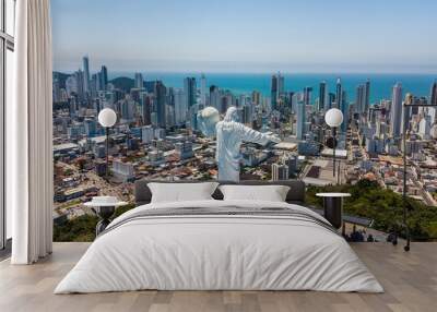 Panoramic aerial view of the Cristo Luz statue and buildings in the city of Balneário Camboriú – Santa Catarina - Brazil Wall mural