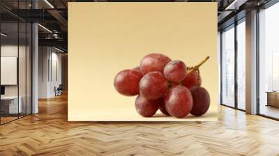 Red grapes on brown background. Wall mural