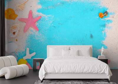 Beach background - starfish, shells, coral on wood table in blue sea color background. top view shot. Wall mural