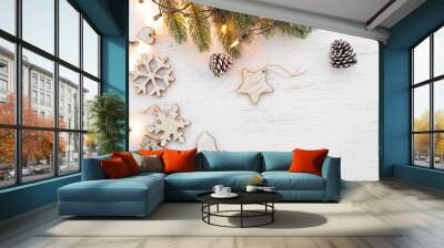 Christmas background - fir leaves and  rustic elements decorating on white wood table. Creative Flat layout and top view composition with border and copy space design. Wall mural