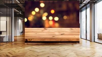 Empty wooden table for product placement or montage with focus to the table top, blurred bokeh background . Wall mural