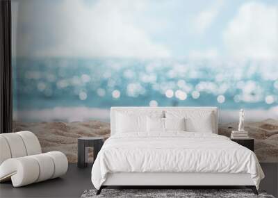 seascape abstract beach background. blur bokeh light of calm sea and sky. focus on sand foreground. Wall mural