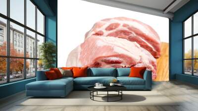 Three pieces of meat are on a wooden cutting board. The meat is raw and uncooked. Concept of anticipation for a meal to come Pork meat isolated on a white background. Wall mural