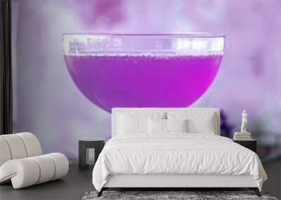 Lavender French 75 Cocktail in Coupe Glass with Fresh Lavender Flowers and Soft Purple Background Wall mural