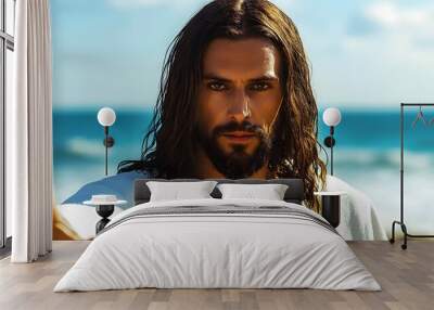 Jesus standing on the beach, his hand outstretched, looking directly at the camera Wall mural