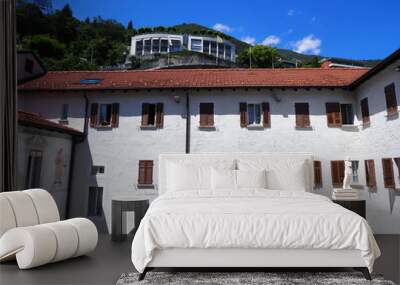 Elevation of white medieval courtyard of Madonna del Sasso church in Locarno city on Lake Maggiore in Switzerland Wall mural