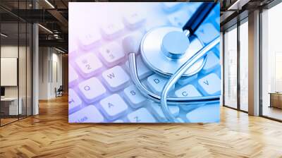 Stethoscope on computer keyboard Wall mural