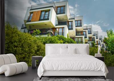 Real estate residential district. Modern ecology architecture. Cube shape. City park. Wall mural