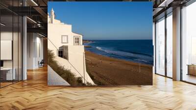 A beautiful sunny view of a sandy beach in Albufeira, Portugal Wall mural