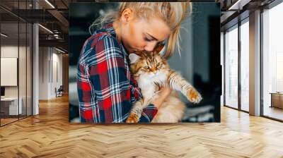 Beautiful young girl holging her ginger cat. Bestfriends. Wall mural