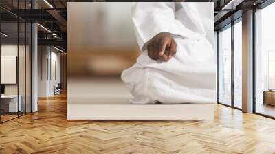 Close-Up Of Male Hands Praying Wall mural