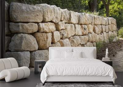 Large, rough stones create a wall. Wall mural