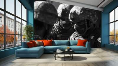 Three soldiers in camouflage gear, one using a radio. Wall mural