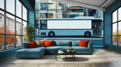 White bus with blank ad space on street. Wall mural