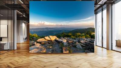 A dramatic sunset viewed from Spruce Knob West Virginia in the Appalachian Mountains looking down on hills in the surrounding valleys Wall mural