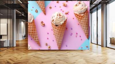 homemade nutty ice cream in waffle cones isolated on colorful background Wall mural