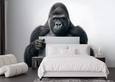 silverback gorilla holding blank sign on white background for copy space advertisement Wall mural