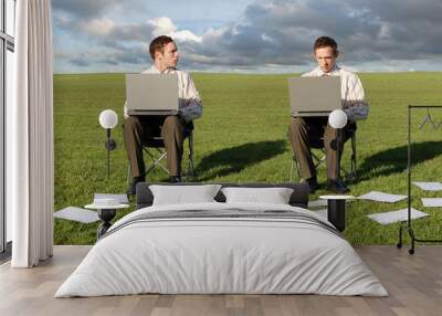 two businessmen on laptops Wall mural