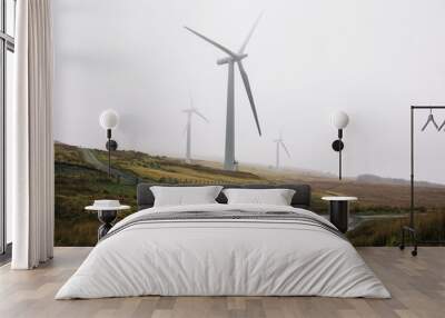 Three large wind turbines in Scotland against a misy background.  Wall mural