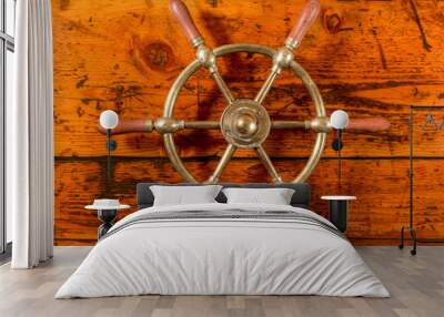 Brass Ship Wheel on Textured Wood Wall mural