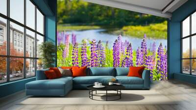 Lupines infront of curvy stream Wall mural