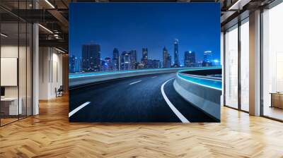 curvy flyover highway moving forward road with bangkok cityscape night scene view . motion blur effe Wall mural