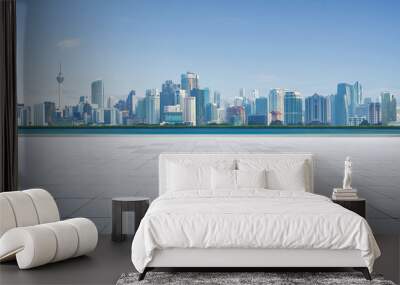 Empty concrete cement floor with sea and cityscape skyline , morning scene . Wall mural