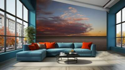 Empty floor with beautiful colorful clouds early morning sky Wall mural