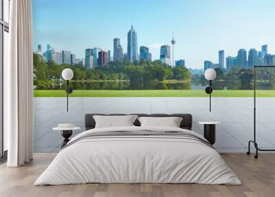 Empty floor with park and modern cityscape . Morning scene . Wall mural