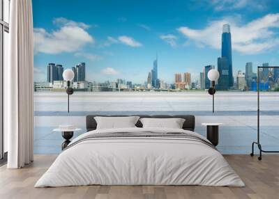 Empty square floor and modern city skyline in the background Wall mural