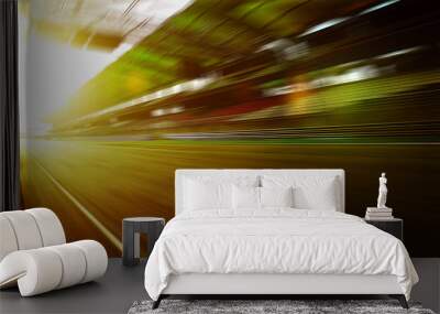 Foward motion speed lens blur racing circuit background with seated stand , sunset scene  . Wall mural