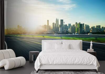 freeway at sunset, motion blur with city background . Wall mural