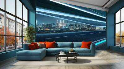 Futuristic style highway road with blue neon light and cityscape background . Wall mural