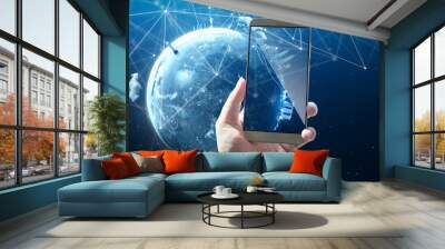 Unknown guy using smartphone with wireless communication network on space background . Wall mural