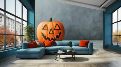 Halloween pumpkin with a spooky face on a gray background, isolated. Wall mural