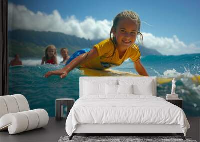 Young girl learning how to surf on the shores of Hawaii. Wall mural