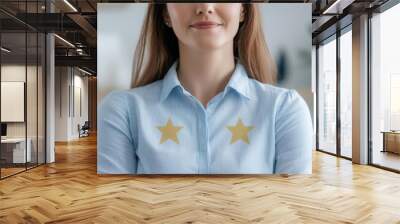 Smiling woman with stars on shirt, indoor setting, natural lighting. Wall mural