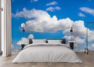 Blue sky background with clouds Wall mural