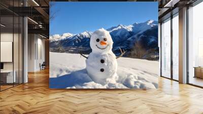 A cheerful snowman with a stunning alpine backdrop on a bright winter day. Wall mural