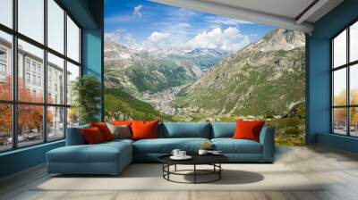 Beautiful panoramic view of Val d'Isere France - captured from Col de l'Iseran road. Amazing sunny day. Green background HD. Wallpaper 4k. Wall mural