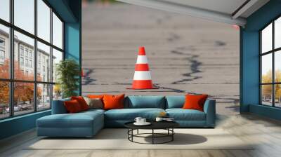 Banner view of bright orange traffic cones ready for slalom on an asphalt surface. Wall mural